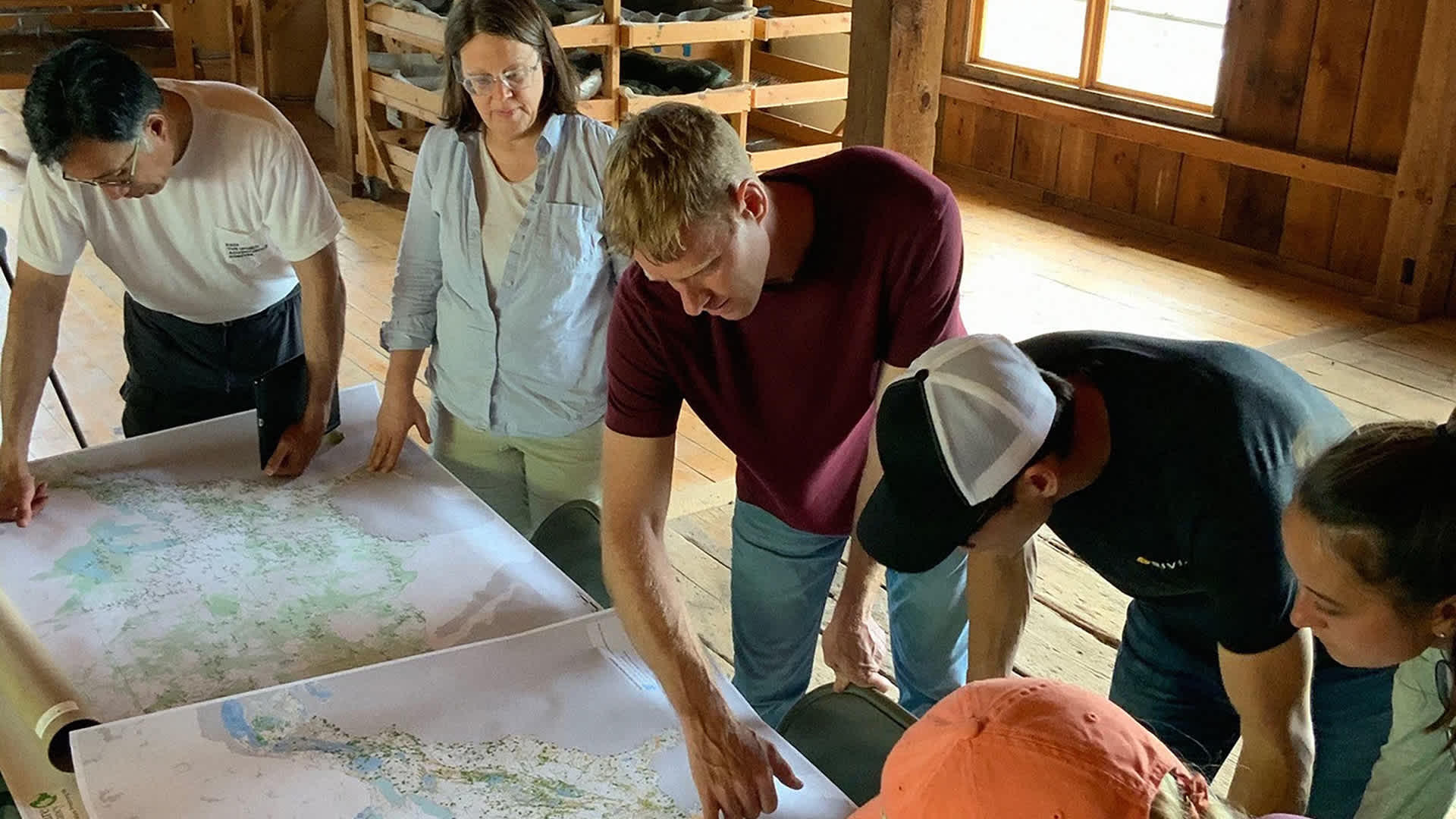 People looking at maps