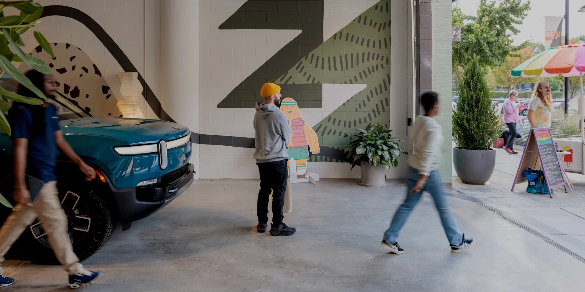 Blue Rivian R1T at Rivian Atlanta space