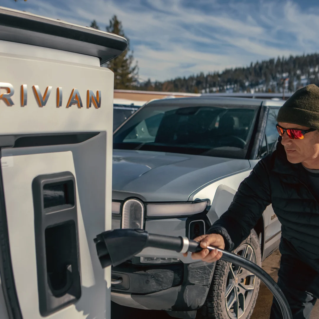 Charging a Rivian vehicle outside Yosemite Charging Outpost