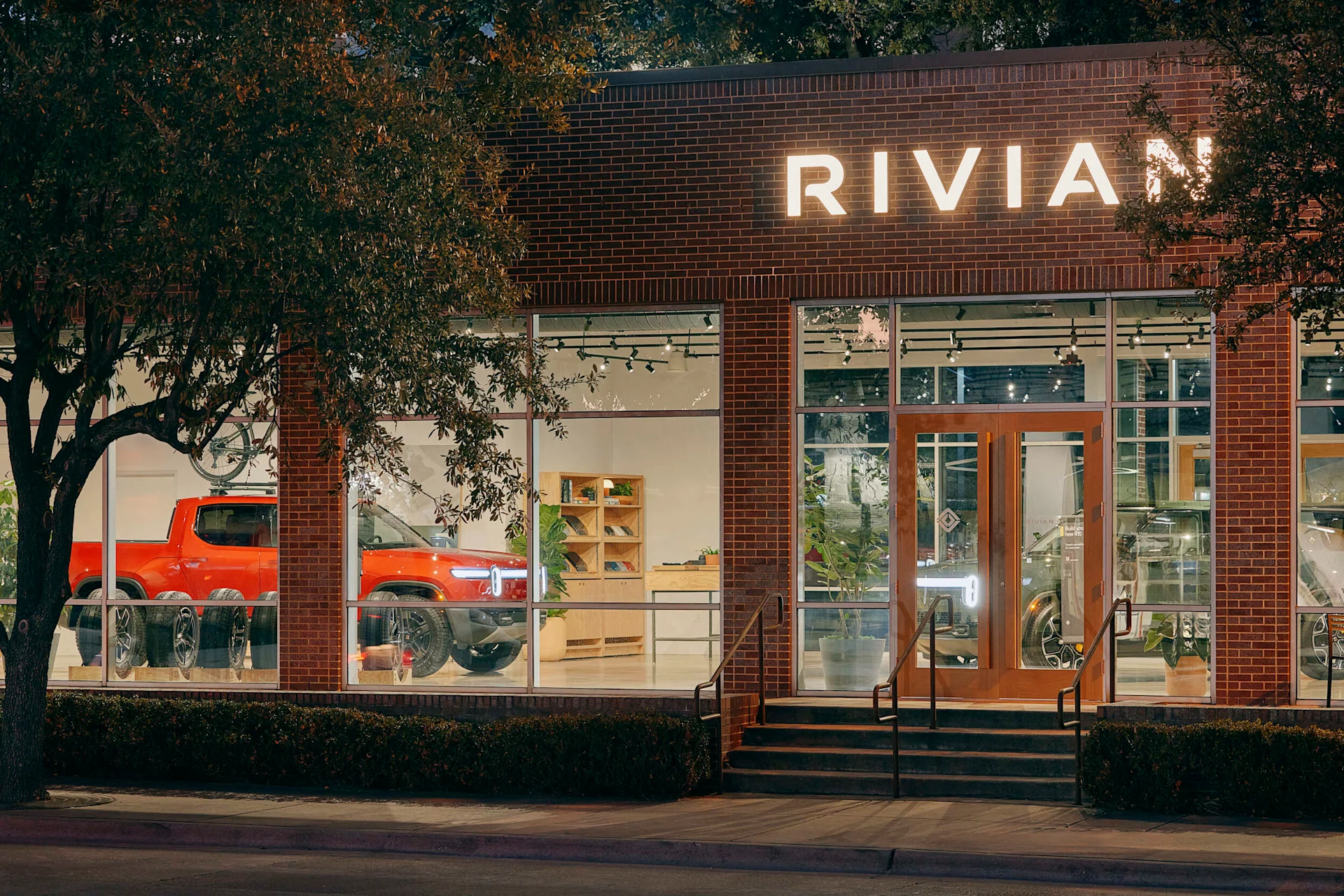 Outside of Rivian Dallas Space at night