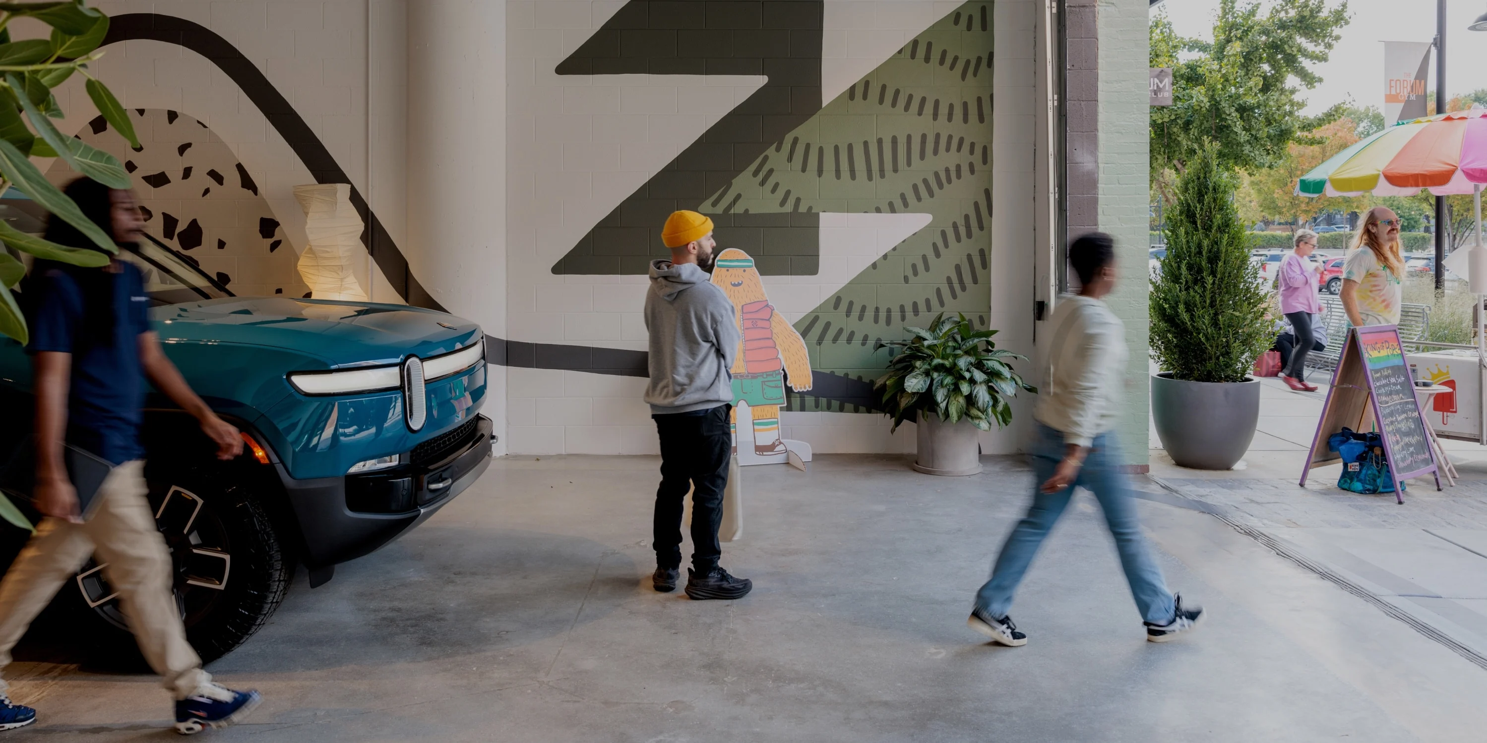 Blue Rivian R1T at Rivian Atlanta space