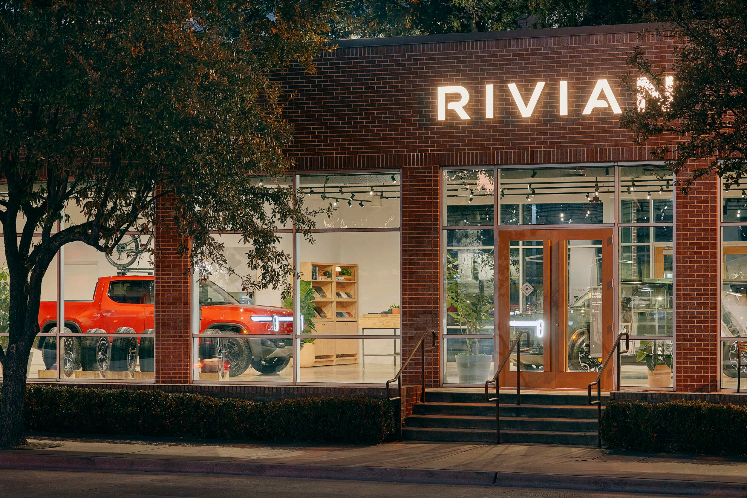 Outside of Rivian Dallas Space at night