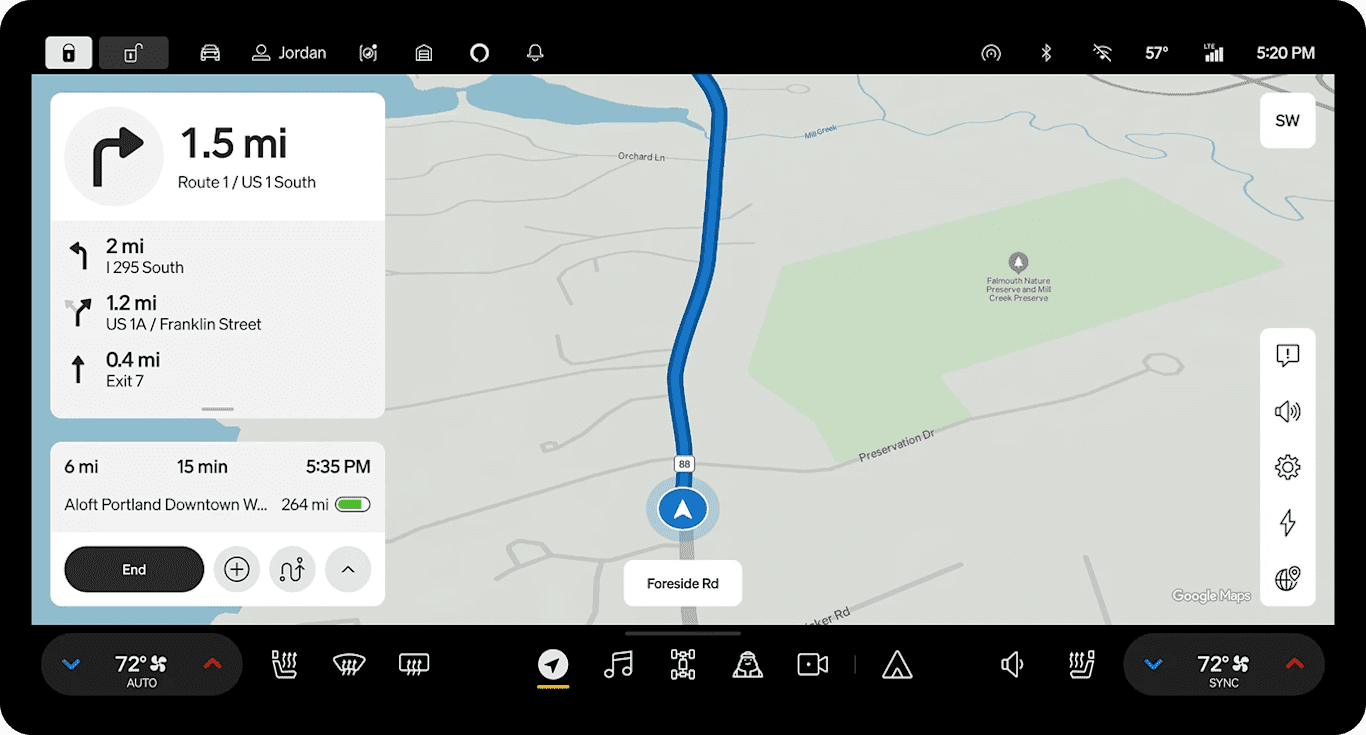 Center display shows the navigation map with a highlighted route.