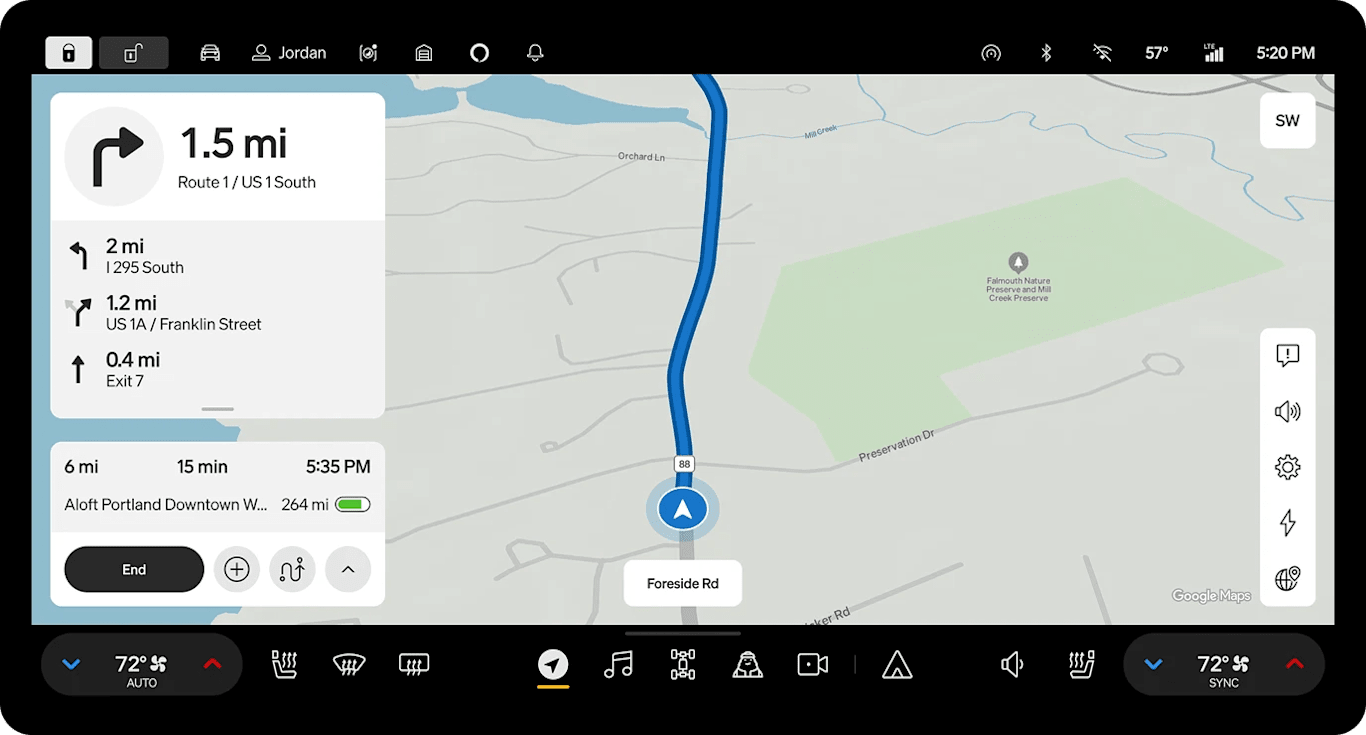 Center display shows the navigation map with a highlighted route.