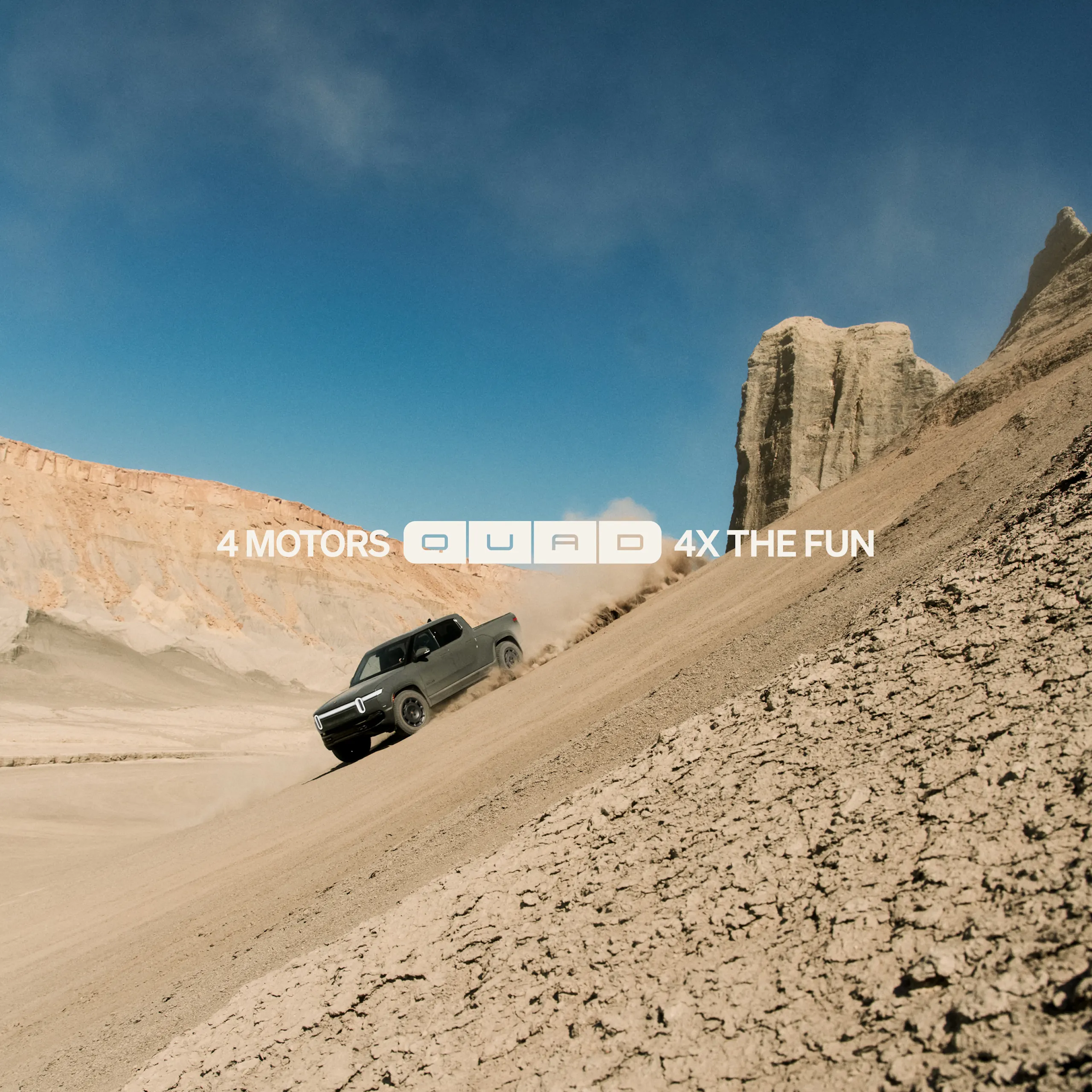 A Rivian R1T electric truck driving at high speed down a steep rock cliff. The car features the limited-edition Launch Green paint color way. 
