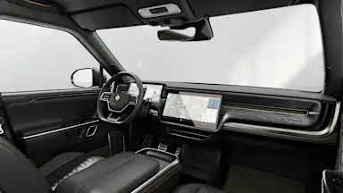 2024 R1S Black Mountain + Dark Ash Wood driver seat view