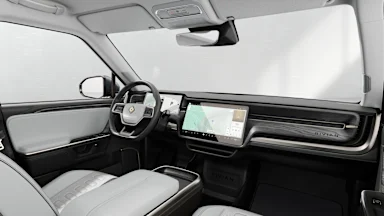 2025 R1S Ocean Coast + Dark Ash Wood driver seat view