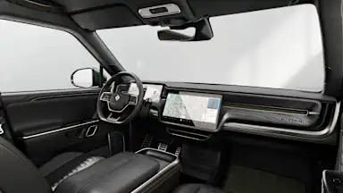 2024 R1S Black Mountain + Dark Ash Wood driver seat view