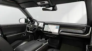 2023 R1S Black Mountain + Dark Ash Wood driver seat view