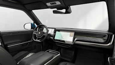 2027 R1S Black Mountain + Dark Ash Wood driver seat view