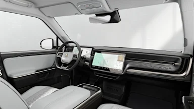 2025 R1S Ocean Coast + Dark Ash Wood driver seat view