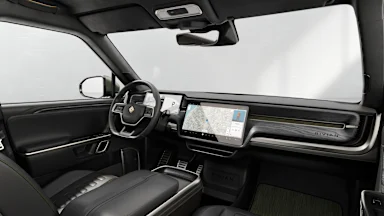 2023 R1S Black Mountain + Dark Ash Wood driver seat view
