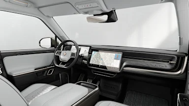 2023 R1S Ocean Coast + Dark Ash Wood driver seat view