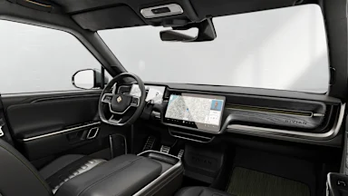 2023 R1S Black Mountain + Dark Ash Wood driver seat view