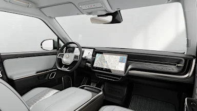 2024 R1S Ocean Coast + Dark Ash Wood driver seat view