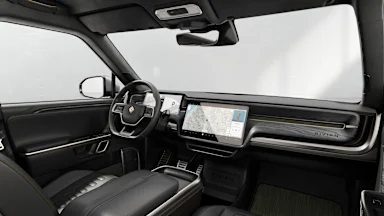 2024 R1S Black Mountain + Dark Ash Wood driver seat view