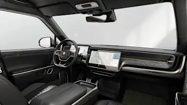 2023 R1S Black Mountain + Dark Ash Wood driver seat view