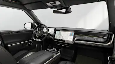 2024 R1S Black Mountain + Dark Ash Wood driver seat view