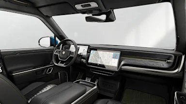 2023 R1S Black Mountain + Dark Ash Wood driver seat view