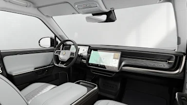 2025 R1S Ocean Coast + Dark Ash Wood driver seat view