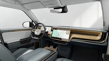 2025 R1S Slate Sky + Walnut Wood driver seat view