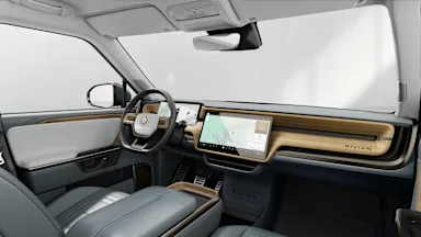 2025 R1S Slate Sky + Walnut Wood driver seat view