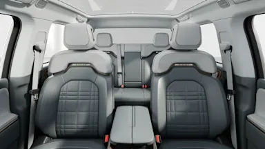 2027 R1T Slate Sky + Walnut Wood back seats view