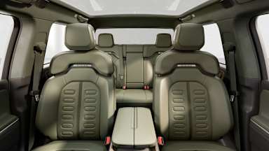 2024 R1T Forest Edge + Warm Ash Wood back seats view