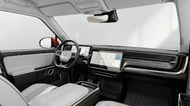 2023 R1T Ocean Coast + Dark Ash Wood driver seat view