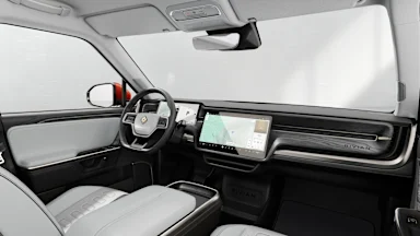 2025 R1T Ocean Coast + Dark Ash Wood driver seat view