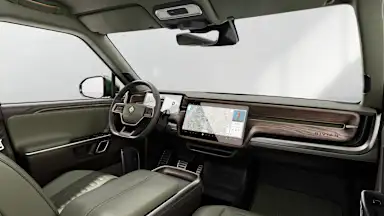 2023 R1T Forest Edge + Warm Ash Wood driver seat view