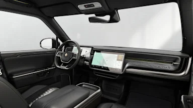 2025 R1T Black Mountain + Dark Ash Wood driver seat view