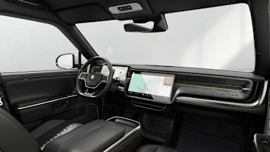 2025 R1T Black Mountain + Dark Ash Wood driver seat view