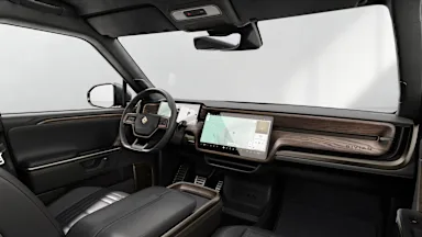 2025 R1T Black Mountain + Brown Ash Wood driver seat view