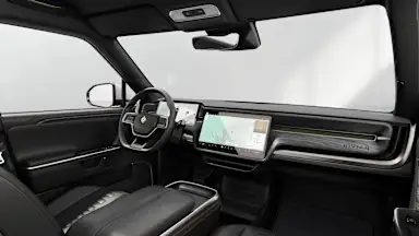 2027 R1T Black Mountain + Dark Ash Wood driver seat view