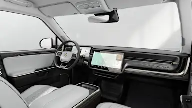2027 R1T Ocean Coast + Dark Ash Wood driver seat view
