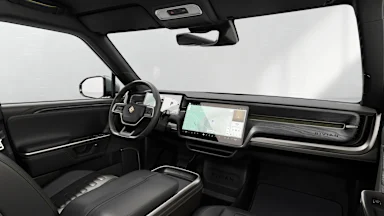 2025 R1T Black Mountain + Dark Ash Wood driver seat view