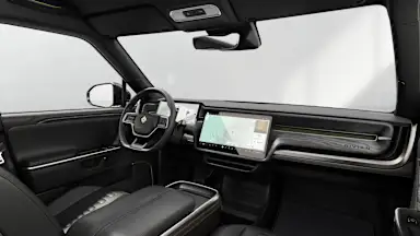 2027 R1T Black Mountain + Dark Ash Wood driver seat view