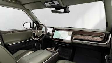 2026 R1T Forest Edge + Brown Ash Wood driver seat view