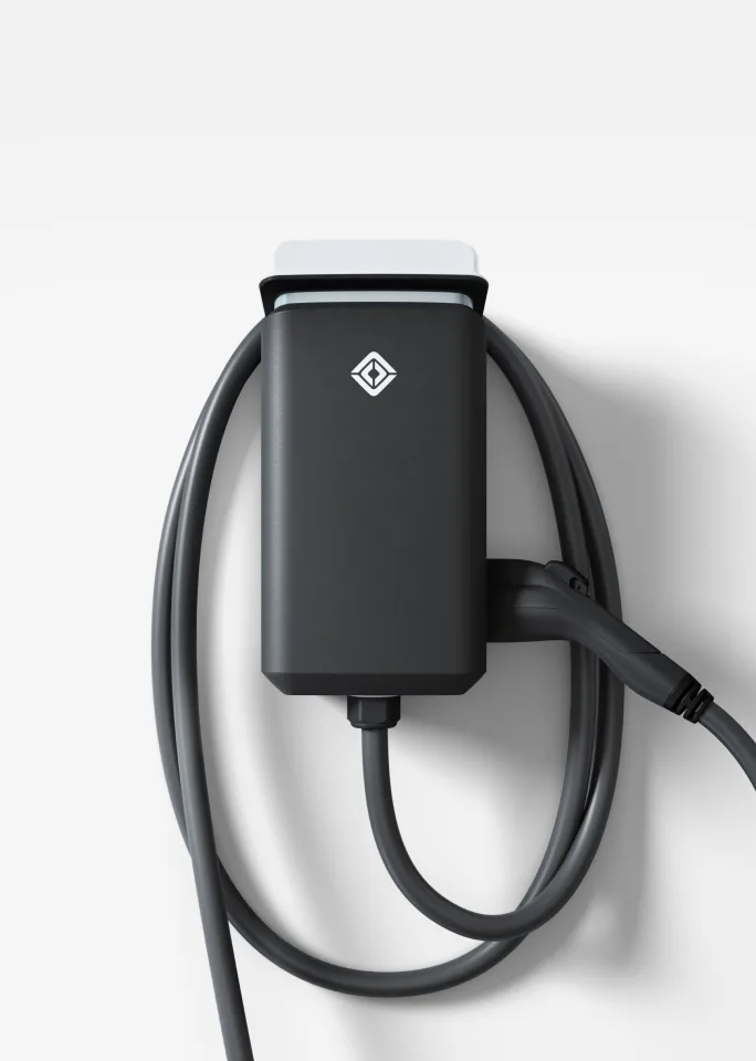 https://media.rivian.com/rivian-main/image/upload/f_webp/q_auto:eco/v1633552055/rivian-com/gearshop/Wall-Charger/Desktop/Wall-Charger-Grid-Portrait-01_hmmlic.jpg